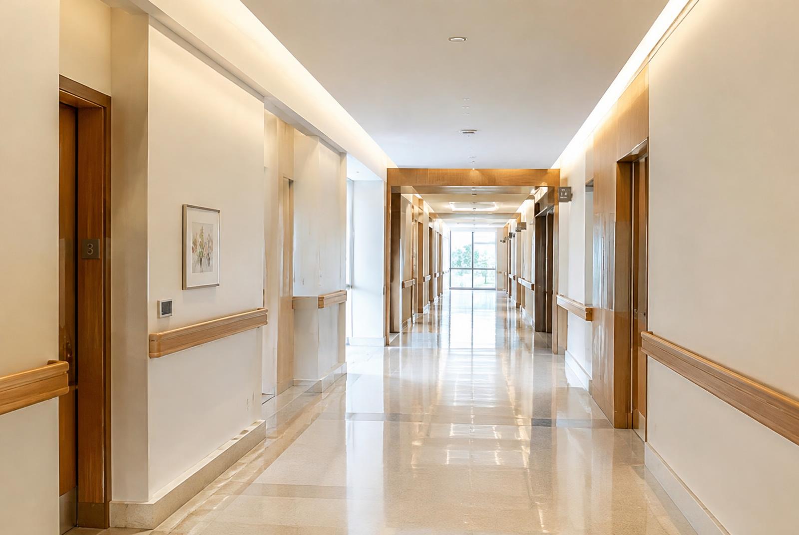 Facility corridor with handrails